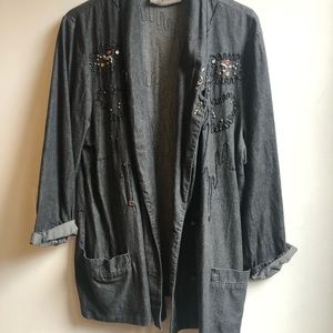 Cool quirky grey denim jacket. Embellishments on both sides of chest.